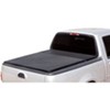 Tonneau cover installed in truck bed.