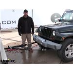 Play video DIY Install: Roadmaster Nighthawk All-Terrain Tow Bar w/ LED Lights on your 2010 Jeep Wrangler