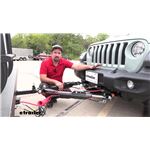 Play video Setting up the Roadmaster Nighthawk All-Terrain Tow Bar w/ LED Lights on your 2023 Jeep Wrangler