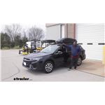 Play video A Closer Look at the Thule Force 3 Sport Rooftop Cargo Box on a 2024 Subaru Outback Wagon