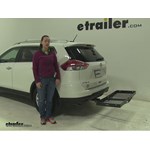 Play video Fit Test: 19x47 Curt Cargo Carrier for 1-1/4" and 2" Hitches on a 2016 Nissan Rogue