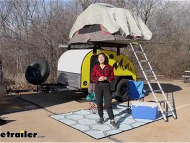 https://images.etrailer.com/static/images/faq/review-etrailer-rv-outdoor-rug-with-stakes-e82kr_644.jpg