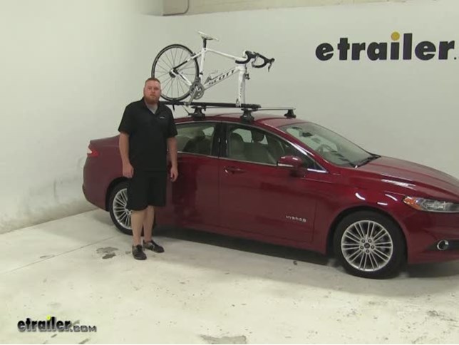Fit Check Kuat Trio Roof Bike Rack on a 2014 Ford Fusion Video etrailer