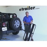 Play video Fit Test: Surco Spare-Tire-Mounted Cargo Basket on a 2012 Jeep Wrangler
