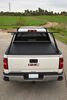0  retractable - manual aluminum and vinyl pace edwards ultragroove tonneau cover w ladder rack 400 lbs