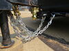 0  safety chains gooseneck hitch towing a trailer on vehicle