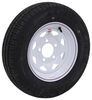 Kenda Karrier s-trail radial tire with 12 inch white wheel. 