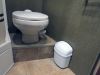 Camco trash can in rv bathroom. 