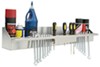 Tow-Rax utility tray and tool rack holding miscellaneous tools. 