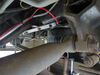 2007 ford f53  front axle suspension enhancement on a vehicle