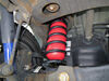 2007 chevrolet avalanche  rear axle suspension enhancement air lift 1000 helper springs for coil -
