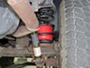 2004 jeep wrangler  rear axle suspension enhancement air springs on a vehicle