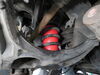 2014 jeep grand cherokee  rear axle suspension enhancement on a vehicle