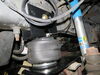 2011 ford f-53  front axle suspension enhancement on a vehicle