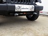 2014 jeep wrangler unlimited  removable drawbars twist lock attachment on a vehicle