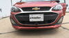 2021 chevrolet spark  removable draw bars twist lock attachment on a vehicle