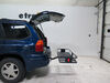 2002 gmc envoy  fixed carrier fits 2 inch hitch on a vehicle