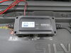 0  battery charger wall outlet to vehicle in use
