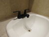 0  standard sink faucet dual handles in use