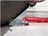 0  wheel chock stabilizer steel fastway onestep for tandem-axle trailers and rvs - 16 inch to 24 long