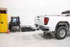 2023 gmc sierra 3500  folding carrier fits 2 inch hitch on a vehicle