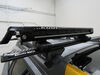 2022 subaru outback wilderness  roof rack 4 pairs of skis 2 snowboards kuat grip ski and snowboard carrier - slide out or boards black
