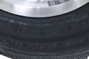 tire with wheel 5 on 4-1/2 inch castle rock st205/75r15 radial w/ 15 margay aluminum - lr c black
