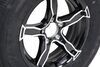 tire with wheel 5 on 4-1/2 inch castle rock st205/75r15 radial w/ 15 liger aluminum - lr c black