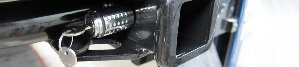 Closeup of trailer hitch lock.