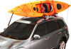0  kayak roof mount carrier on a vehicle