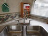 0  standard sink faucet dual handles in use