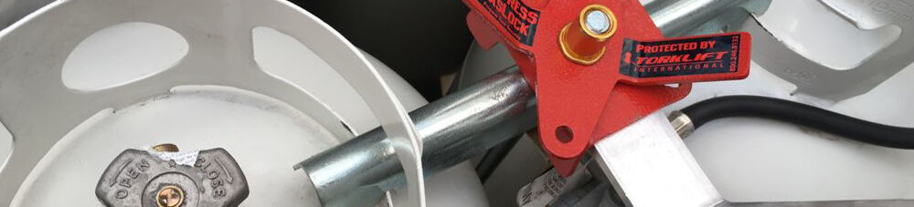 Closeup of propane tank lock on propane tanks.