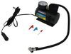 roadside emergency winter performance tool kit with tire inflator jumper cables and warning triangle