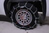 2022 gmc sierra 1500  tire chains on road only pewag w/ cams - ladder pattern grooved square link assisted tensioning 1 pair