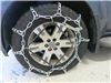 2010 nissan pathfinder  tire chains on road or off pewag wide base - ladder pattern grooved square link manual tension 1 pair