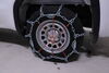 2022 gmc sierra 1500  tire chains on road only pewag wide base w cams - ladder pattern grooved square link assisted tension 1 set