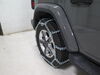 2020 jeep wrangler unlimited  tire chains on a vehicle