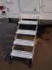 TorkLift GlowStep Stow N' Go Scissor Steps w/ Landing Gear - 4 Steps - 375 lbs - White Bracket customer photo