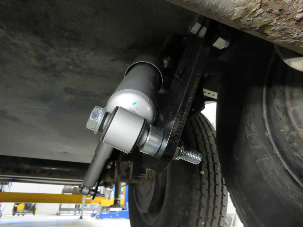 Hydraulic shock absorber for leaf spring trailers - UNITRAILER