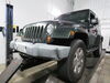 2010 jeep wrangler  removable draw bars twist lock attachment on a vehicle