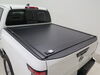 2022 nissan frontier  retractable - manual hard plastic retraxone mx tonneau cover polycarbonate matte black stake pocket cutouts