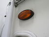 0  porch light utility 6l x 3-1/2w inch rv - incandescent oval black housing amber lens