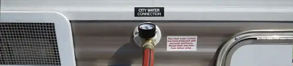 Close up of RV city water connection.