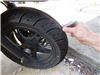 0  tire tools tread depth gauge on a vehicle