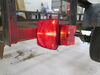 0  tail lights 6-1/8l x 4-9/16w inch combination light for trailers over 80 wide - submersible 8 function driver side