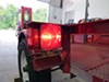 0  tail lights 6-1/8l x 4-9/16w inch combination light for trailers over 80 wide - submersible 8 function driver side