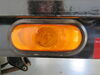 0  tail lights parking turn optronics trailer signal and light - submersible incandescent oval amber lens