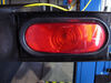 0  tail lights 6-1/2l x 2-1/4w inch optronics trailer light - stop turn submersible incandescent oval red lens