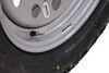 tire with wheel 15 inch taskmaster st235/75r15 radial off-road w/ vesper silver mod - 5 on 4-1/2 lr d