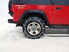 1995 jeep wrangler  tire chains on road or off titan chain low profile - ladder pattern twist links manual tensioning 1 pair